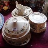 A Royal Doulton Larchmont part dinner service including vegetable tureens, assorted plates, meat