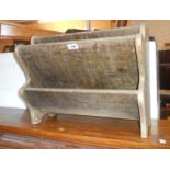 A vintage wood magazine rack with shaped standard ends - finish a/f