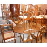 A set of six mahogany framed dining chairs with wheatsheaf backs, comprising four standard and two