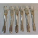 A harlequin set of six silver fiddle pattern dessert forks - various condition