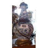 An antique Dutch Delftware lobed vase - converted to an electric table lamp with brass fittings
