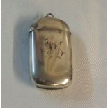 A silver flip-top lozenge shaped vesta case with engraved initials