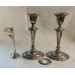 A pair of 20.5cm high silver candlesticks in the Georgian style with detachable nozzles (one a/f)
