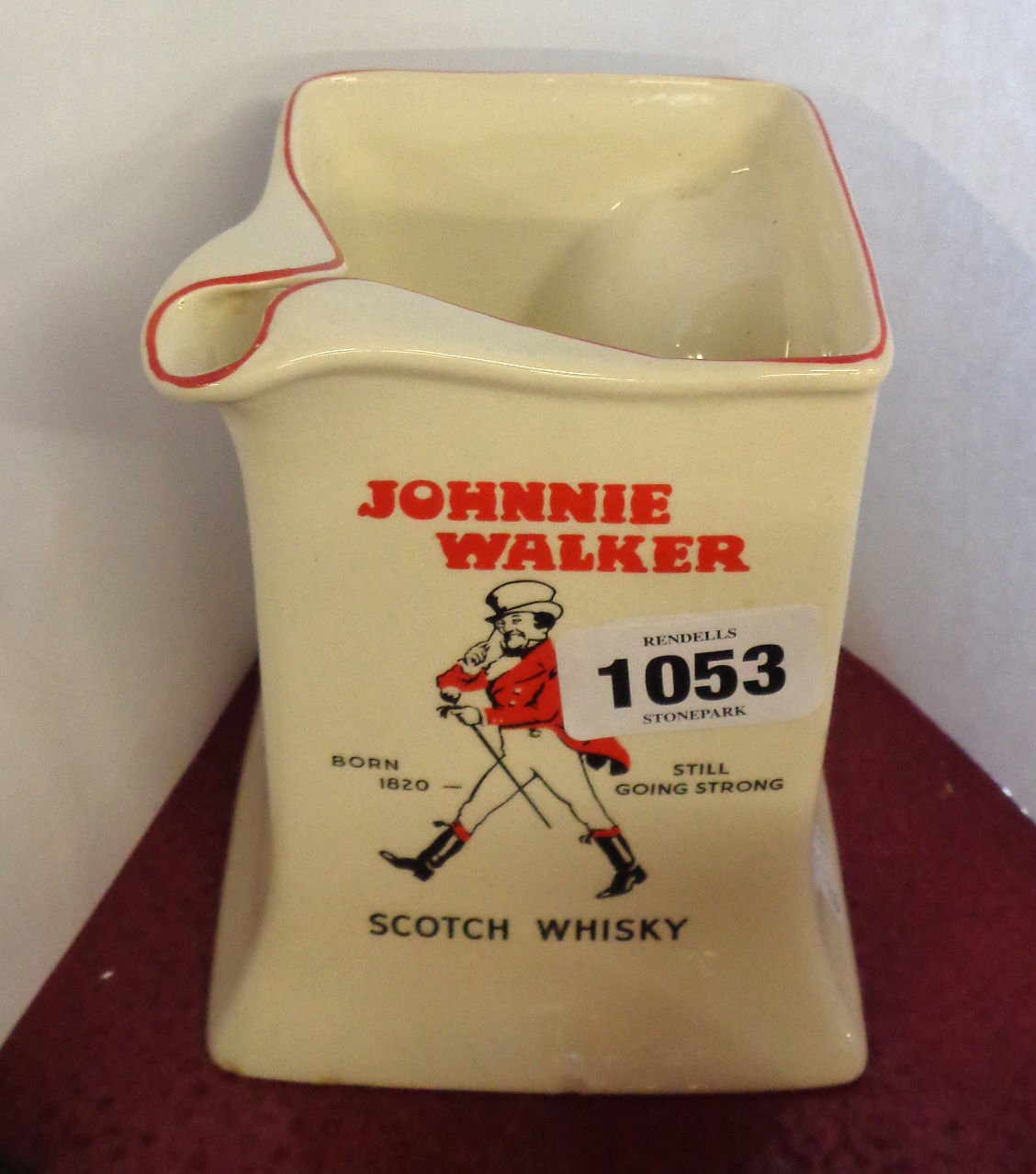 A vintage Wade Regicor pub water jug advertising Johnnie Walker Scotch Whisky