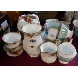 A Royal Albert Old Country Roses part tea set comprising five trios, milk and sugar, bread and