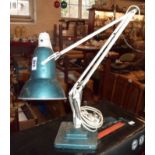 A vintage Herbert Terry anglepoise lamp with stepped base and later painted finish