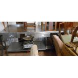 A 2.4m modern professional stainless steel catering preparation counter with three frieze drawers
