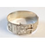 A silver bolt pattern bangle with engraved decoration