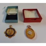 Two boxed 9ct. gold and enamel sporting fobs, one for Saltley Rangers, the other Sutton and District