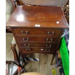 A 53cm Edwardian mahogany and strung music chest with four Stone's Patent drop-front drawers, set on