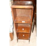 A vintage small narrow stained oak three shelf open bookcase