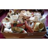 A box containing a large quantity of ceramic and other collectable shoes including Royal Albert