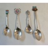 Three tourist silver and part enamelled spoons and another, comprising 'International Order of