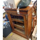 A 77cm Victorian inlaid rosewood pier cabinet with gilt metal mounts and material lined interior