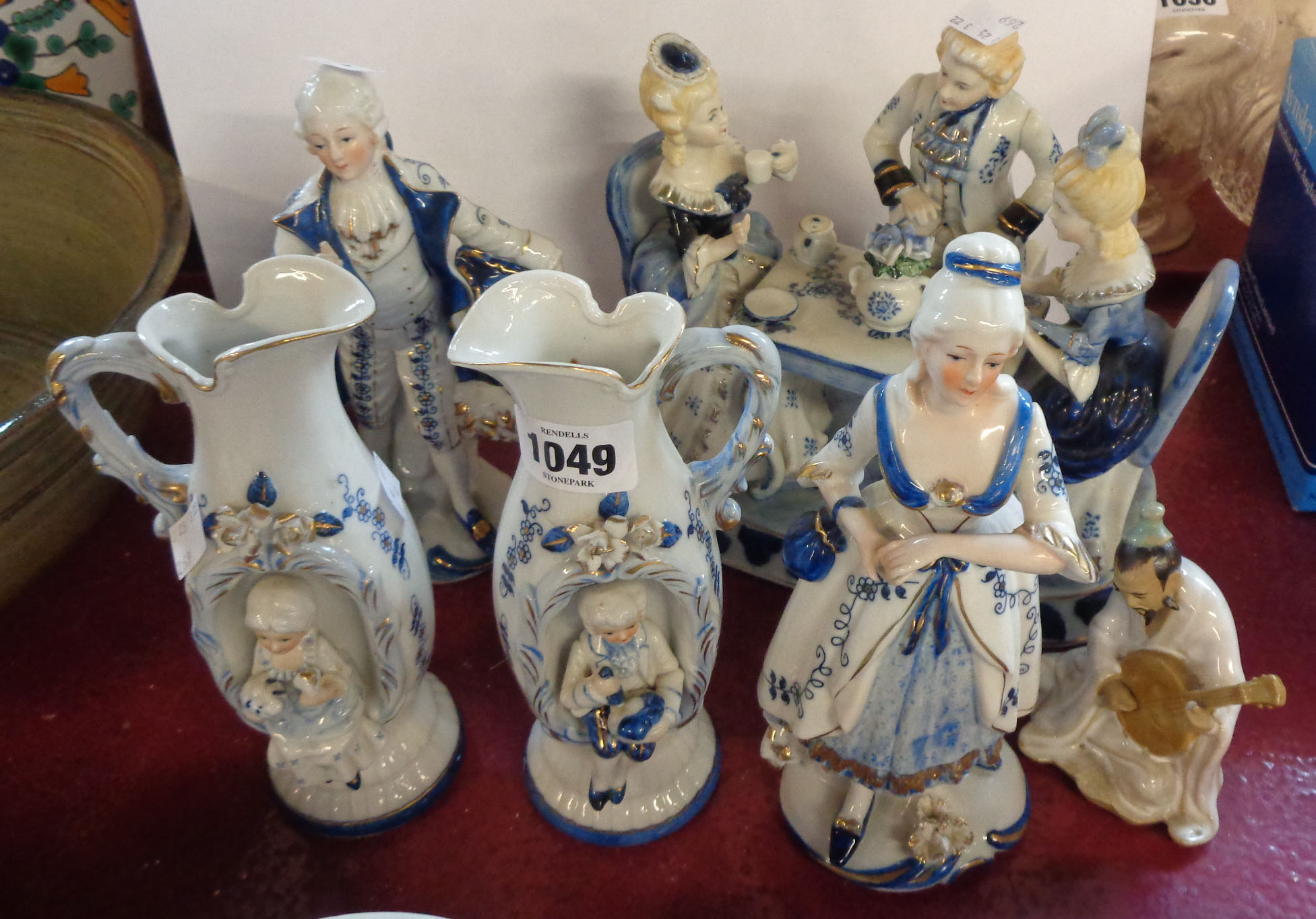 A small selection of 20th Century continental porcelain figurines