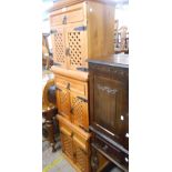 Three matching 58cm Swiss (Basel) stained mixed wood kitchen cabinets, each enclosed by a pair of
