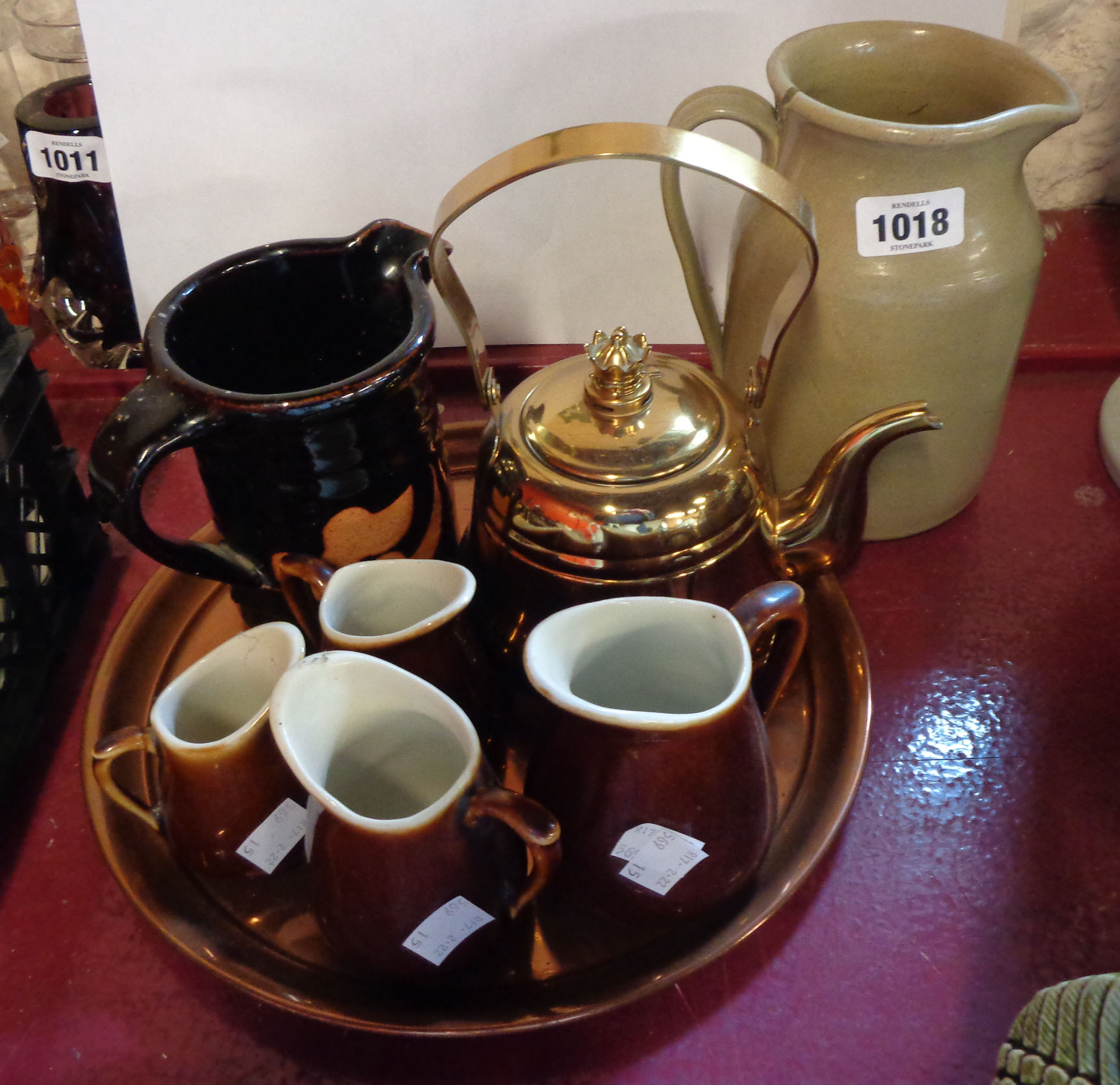 A quantity of assorted collectable items including jugs, etc. - various condition