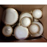 A box containing a Noritake porcelain part tea set with gilt decoration