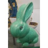 A small green SylvaC rabbit