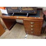 A 1.37m retro Cooke's Ltd. sapele wood veneered single pedestal desk with green composite inset top,