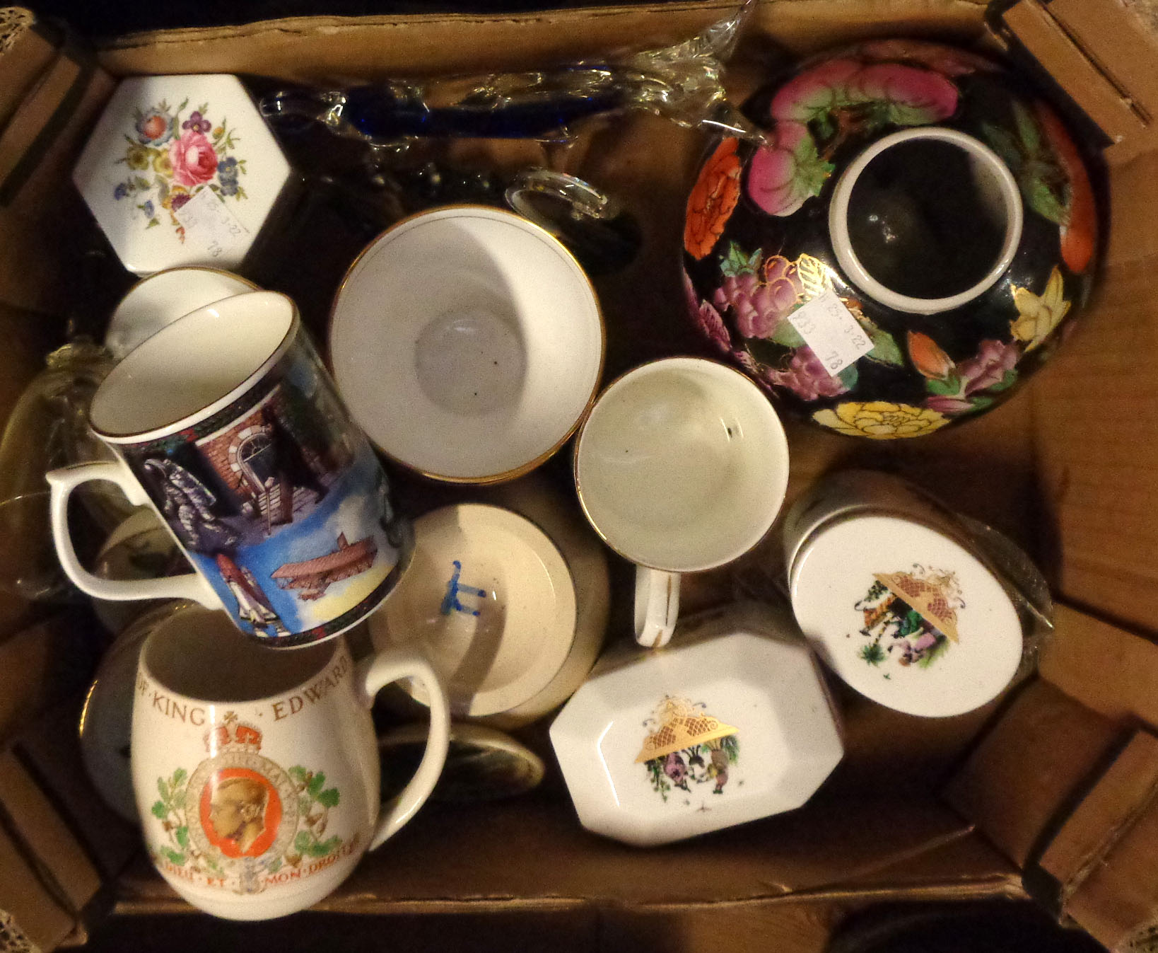 A box containing a quantity of ceramic items including Royal Worcester pin dishes and trinket boxes,