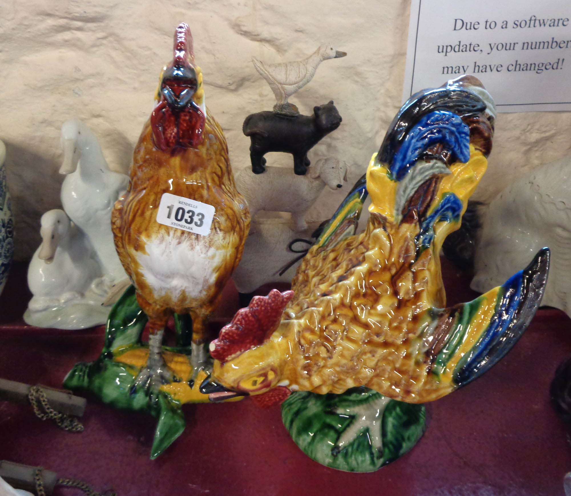 A 20th Century Caldas Portugal majolica figurine of a cockerel - sold with another similar, a