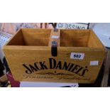 A wooden Jack Daniels two bottle holder