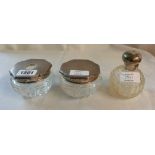 A matching silver topped cut glass hair tidy and powder jar with engine turned decoration and