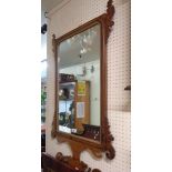 A 19th Century mahogany fret-cut framed wall mirror with oblong plate and gilt lined border -