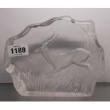 A Kosta Glacier glass paperweight with reverse moulded and frosted design depicting an antelope