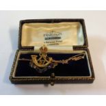 A yellow metal and enamelled military insignia bar brooch for the 57th Wylde's Rifles F.F. (Frontier