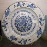 An 18th Century Chinese blue and white plate with extensive old stapled repair