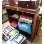 A 90cm vintage polished oak three shelf open bookcase with moulded top, set on plinth base