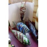 Four Murano glass fish ornaments comprising three standing and one upright vase form, all