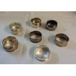 A collection of seven assorted silver napkin rings - no personalisation