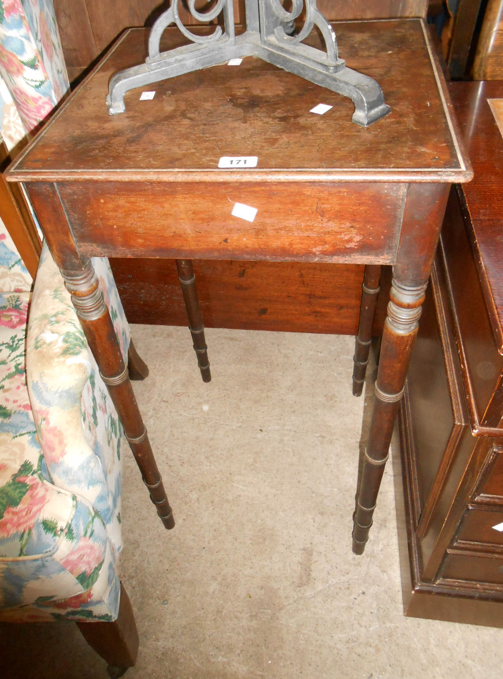 A 48cm late Georgian mahogany side table, set on high ring turned legs