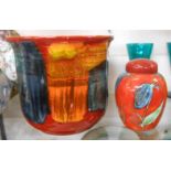 A modern Poole Pottery jardiniere with orange and red decorative glaze effect - sold with a