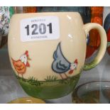 A modern Moorcroft Pottery mug with all around tube-lined decoration depicting chickens feeding -