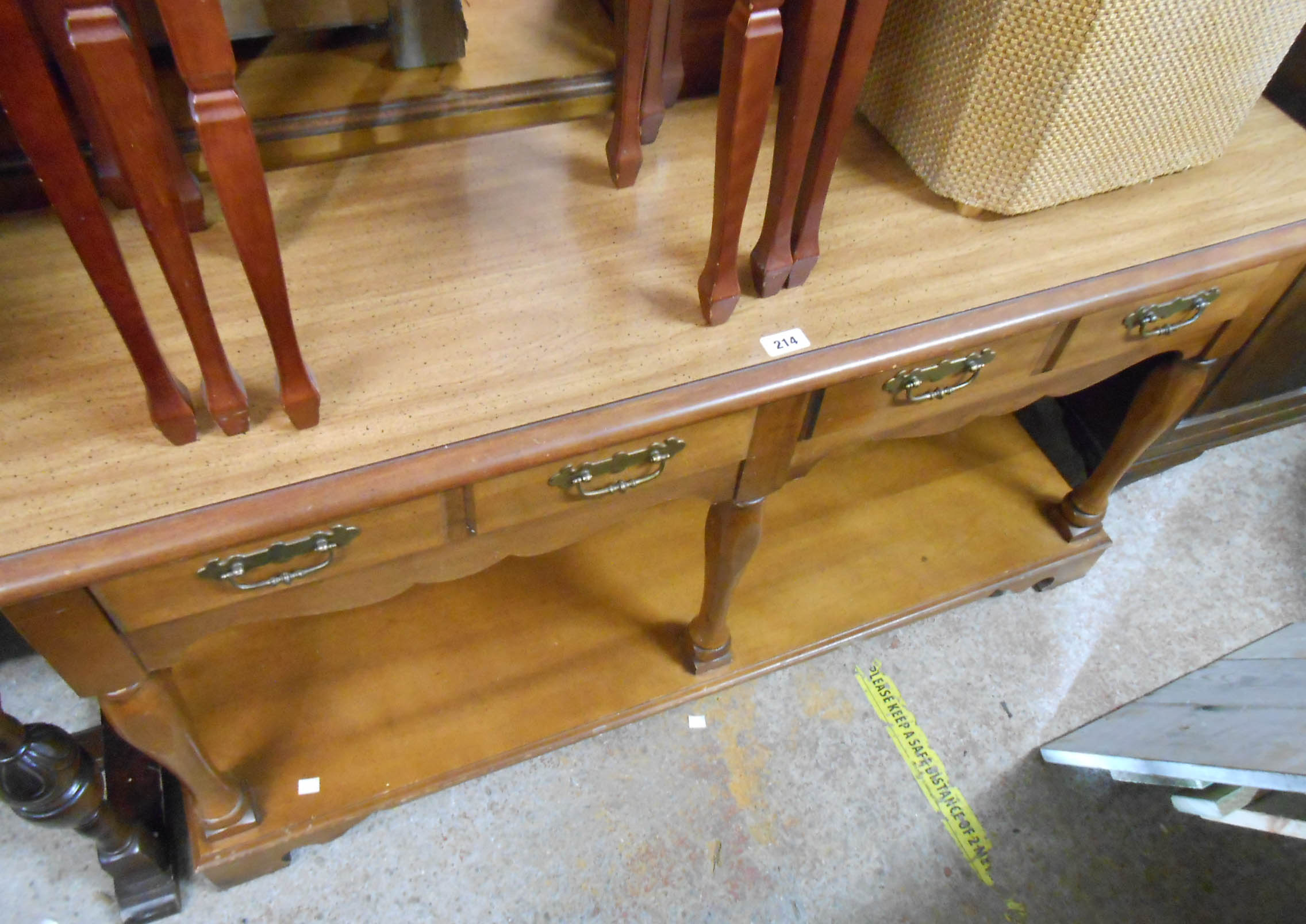 A 1.37m reproduction mahogany Georgian style potboard dresser base with two frieze drawers and