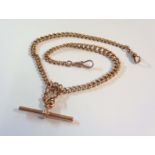 A 375 / 9ct. rose gold double Albert watch chain with T-bar and two lobster clasps