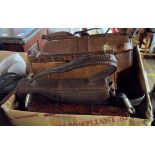 A box containing five old leather and snakeskin handbags