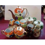 A Japanese eggshell porcelain part coffee set - sold with a pottery teapot, sucrier and milk jug