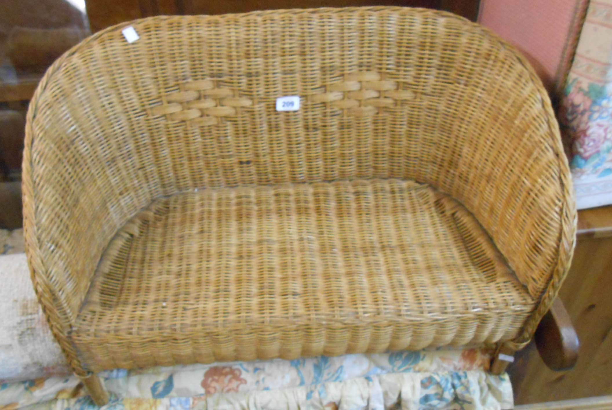 A 73cm wide child's wicker and bent cane two seater settee