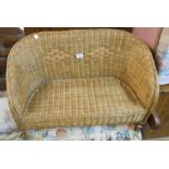 A 73cm wide child's wicker and bent cane two seater settee