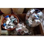 A box containing a large quantity of ceramic and other collectable thimbles, glassware, etc.