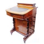 A 53cm Victorian inlaid walnut Davenport with lift-top compartment, part fitted interior and four