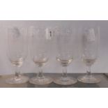 A set of four early 20th Century advertising glasses for Old Monk Port