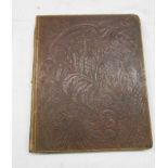 A late Victorian cookbook with extensive handwritten recipes and 4to. tooled leather binding