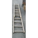 An old wooden extending ladder - for decorative use only