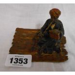A late 19th Century Austrian cold painted bronze figurine in the Franz Bergman manner depicting a